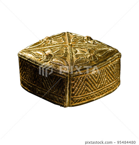 A golden headdress with decorative elements and ornaments on a white background A golden headdress with decorative elements and ornaments on a white background 95484480