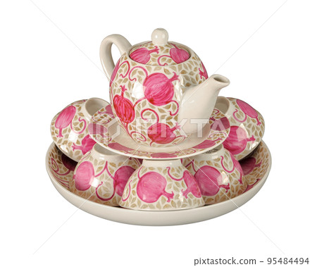 A vintage oriental ceramic teapot and cups isolated on a white background A vintage oriental ceramic teapot and cups isolated on a white background 95484494