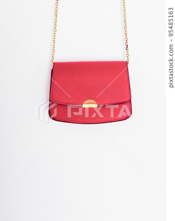Coral fashionable leather purse with gold details as designer bag and stylish accessory, female fashion and luxury style handbag collection concept Coral fashionable leather purse with gold details as designer bag and stylish accessory, female fashion and luxury style handbag collection concept 95485163
