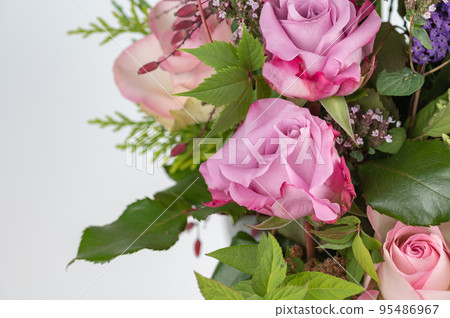 Rose flower bouquet on white background close up Rose flower bouquet on white background close up 95486967