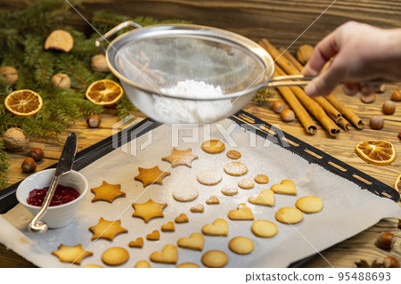 Christmas linzer cookies on the baking tray 95488693