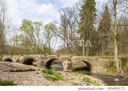 baroque Tousicky bridge over Vyrovka brook, Czech Republic 95489171