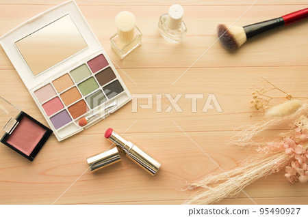Makeup tools background (eye color, lipstick, cheek, nail, brush) 95490927