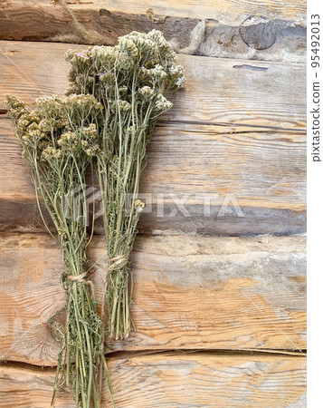 Dried medicinal flowers and herbs on wooden background. Studio Photo Dried medicinal flowers and herbs on wooden background. Studio Photo 95492013