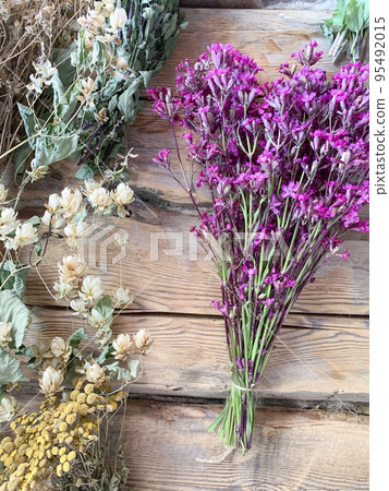Dried medicinal flowers and herbs on wooden background. Studio Photo Dried medicinal flowers and herbs on wooden background. Studio Photo 95492015