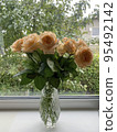 Bouquet of fresh roses in crystal vase. Studio Photo 95492142
