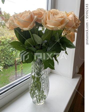 Bouquet of fresh roses in crystal vase. Studio Photo Bouquet of fresh roses in crystal vase. Studio Photo 95492143