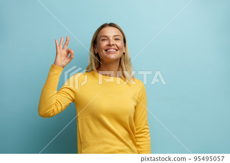 Happy Woman Ok Gesture Isolated. Satisfied Girl Showing Ok Sign at Camera 95495057