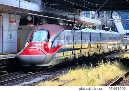 Akita Shinkansen "Komachi" arriving at Akita Station 95495692