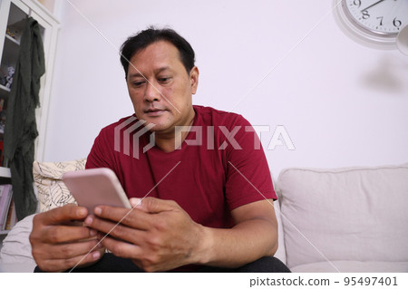 Man with Technology Man with Technology 95497401
