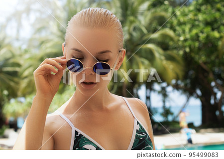 young beautiful stylish woman summer vacation in 95499083