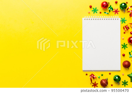 Christmas blank greeting card mock-up scene. Creative layout made of Christmas tree branches and paper card note. Flat lay. Nature New Year concept 95500470