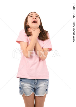 Young beautiful girl in a pink t-shirt and denim shorts on a white background Young beautiful girl in a pink t-shirt and denim shorts on a white background 95501059