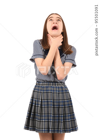 Young beautiful girl in a school uniform on a white background Young beautiful girl in a school uniform on a white background 95501091