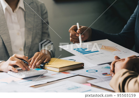 Group of business asian people analysis financial graph on desk at meeting room 95503159