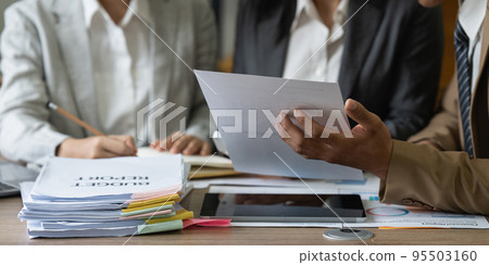 Group of Businesswoman and Accountant checking data document on laptop for investigation of corruption account 95503160
