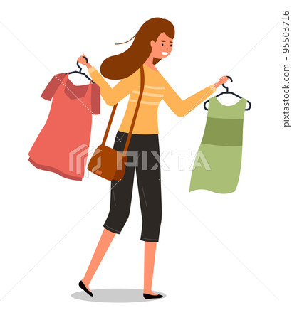 Girl with a hangers with t-shirts in her hands goes shopping. Buyer is selecting clothes in a store 95503716