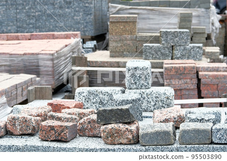 Granite stones are sold in construction market. Construction Materials. Building materials for decoration and construction. Close up. 95503890