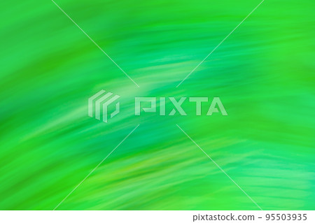 Green abstract defocused motion blurred background. Green abstract defocused motion blurred background. 95503935