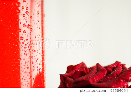 Rose water in glass bottle Rose water in glass bottle 95504064