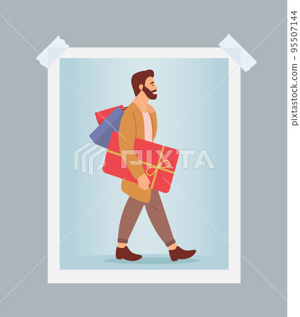 Photo of a serious man with gift boxes in his hands. Young shopper guy posing on the blue background 95507144