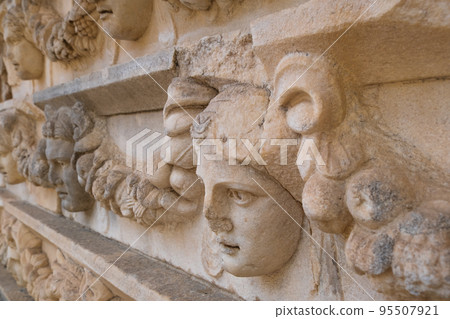 Sculpted Greek mask recovered from the ruins of the theater of Aphrodisias ancient city Aydin, Turkey 95507921