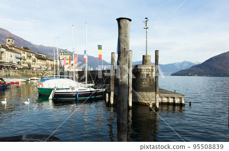 Cannobio. ITALIA. Embankment of Cannobio on the lake Maggiore in the winter afternoon 95508839