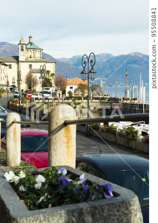 Cannobio. ITALIA. Embankment of Cannobio on the lake Maggiore in the winter afternoon 95508841
