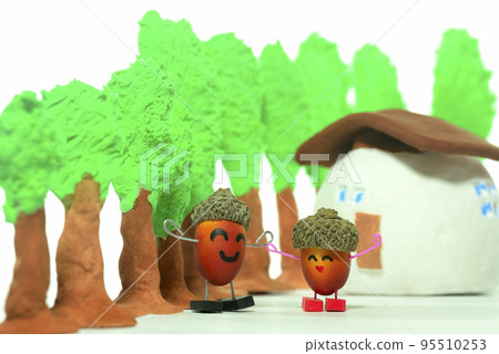 Miniature houses in clay woodland and character acorns 95510253