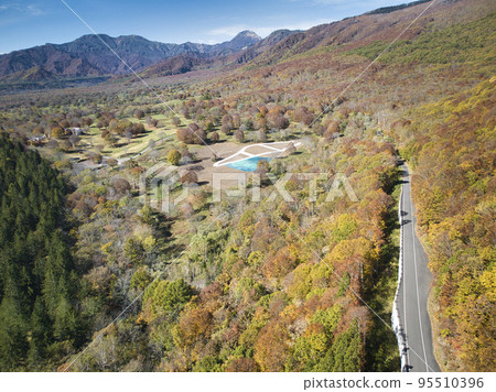 Beautiful autumn leaves of Sasagamine Highlands and Mt.Yakeyama, Myoko City, Niigata Prefecture (aerial photography by drone) Beautiful autumn leaves of Sasagamine Highlands and Mt.Yakeyama, Myoko City, Niigata Prefecture (aerial photography by drone) 95510396