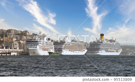 Three huge cruise ship docked at Galataport, Bosphorus, Karakoy, district, with Galata Tower, Istanbul, Turkey Three huge cruise ship docked at Galataport, Bosphorus, Karakoy, district, with Galata Tower, Istanbul, Turkey 95513809