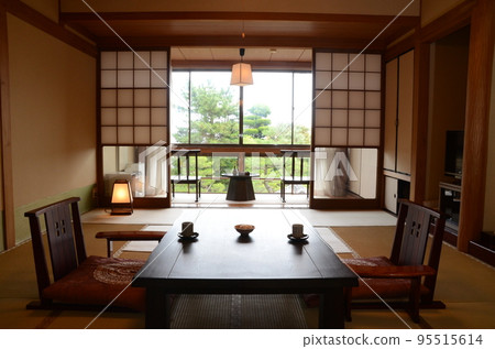 Image of a guest room in a long-established inn 95515614