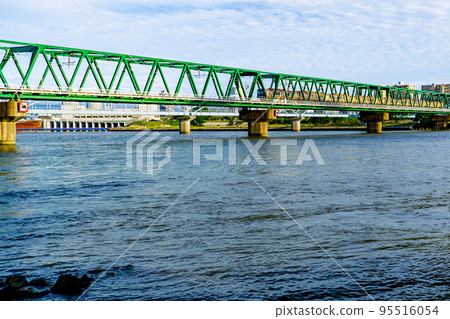 Hankyu Senri Line Yodogawa Bridge and Osaka Municipal Subway over the Yodo River in Osaka Prefecture Hankyu Senri Line Yodogawa Bridge and Osaka Municipal Subway over the Yodo River in Osaka Prefecture 95516054