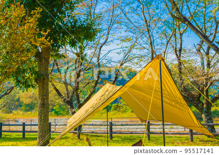 Tarp tent setup campsite image material 95517141