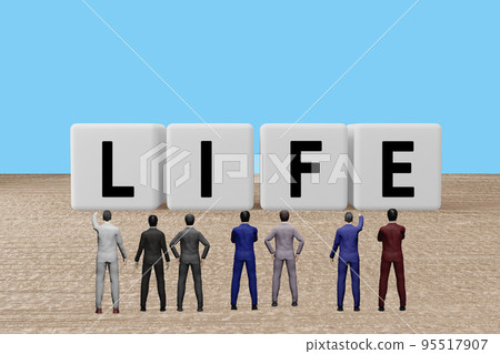 Businessman looking at LIFE letter blocks 95517907
