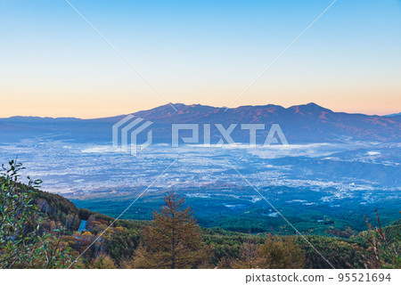 Morning Yatsugatake mountain range seen from Takamine Plateau, Nagano Prefecture 95521694