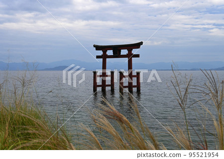 Shirahige Shrine Otorii standing on Lake Biwa in the early autumn afternoon 95521954