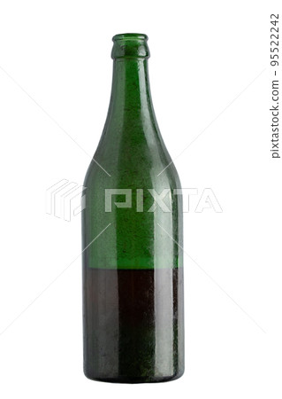 Old fashioned drug bottle. Old dirty green color bottle isolated on white background. Wine bottle. 95522242