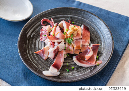 Raw edible boiled squid sashimi 95522639