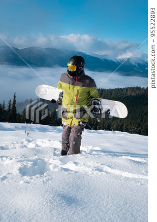 man snowboarder portrait carpathian mountains on background man snowboarder portrait carpathian mountains on background 95522893