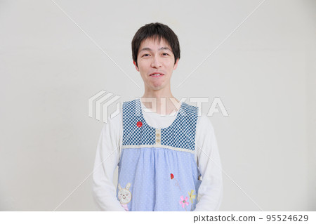 Refreshing male nursery teacher and white background 95524629