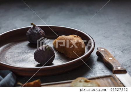 Making ham sandwiches 95527222