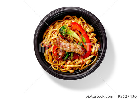 Spicy Chinese udon noodles with stir-fry veal and vegetables served in bowl Spicy Chinese udon noodles with stir-fry veal and vegetables served in bowl 95527430