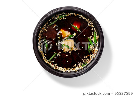 Bowl of miso soup with tofu, chopped green onions and sesame Bowl of miso soup with tofu, chopped green onions and sesame 95527599