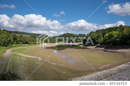 Drought in Germany, low water in Henne lake, Sauerland, Germany Drought in Germany, low water in Henne lake, Sauerland, Germany 95530753