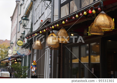 background of European city street with shop windows 95531301