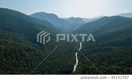 Aerial mountain landscape and river natural scenery in Russia, Adygea, Guzeripl, Plateau Lago-Naki. Aerial mountain landscape and river natural scenery in Russia, Adygea, Guzeripl, Plateau Lago-Naki. 95531707