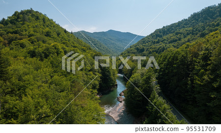 Aerial mountain landscape and river natural scenery in Russia, Adygea, Guzeripl, Plateau Lago-Naki. Aerial mountain landscape and river natural scenery in Russia, Adygea, Guzeripl, Plateau Lago-Naki. 95531709