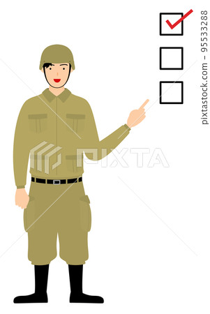 Male soldier poses, pointing to checklist 95533288