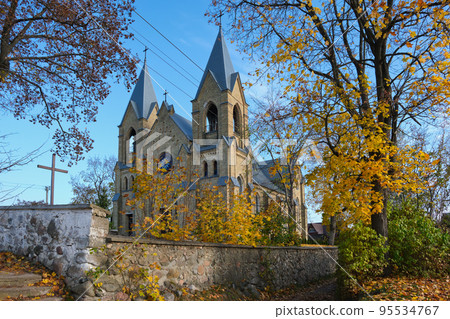 Old ancient church of Our Lady of the Holy Rosary and St Dominic in autumn, Rakov, Minsk region, Belarus. Old ancient church of Our Lady of the Holy Rosary and St Dominic in autumn, Rakov, Minsk region, Belarus. 95534767